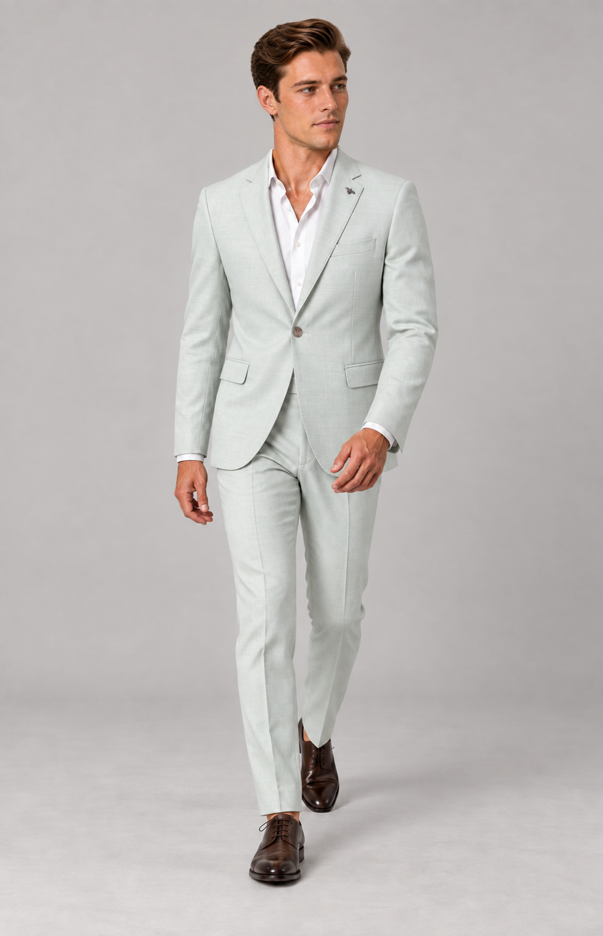 Full-length view of the mint Quinn 1907 suit trousers, styled with a matching jacket