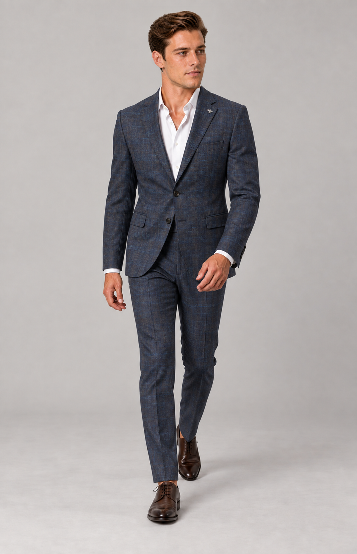 M01 wearing the navy Harper 2138 textured-check suit, full-length walking view. Trousers only; other items are styling.