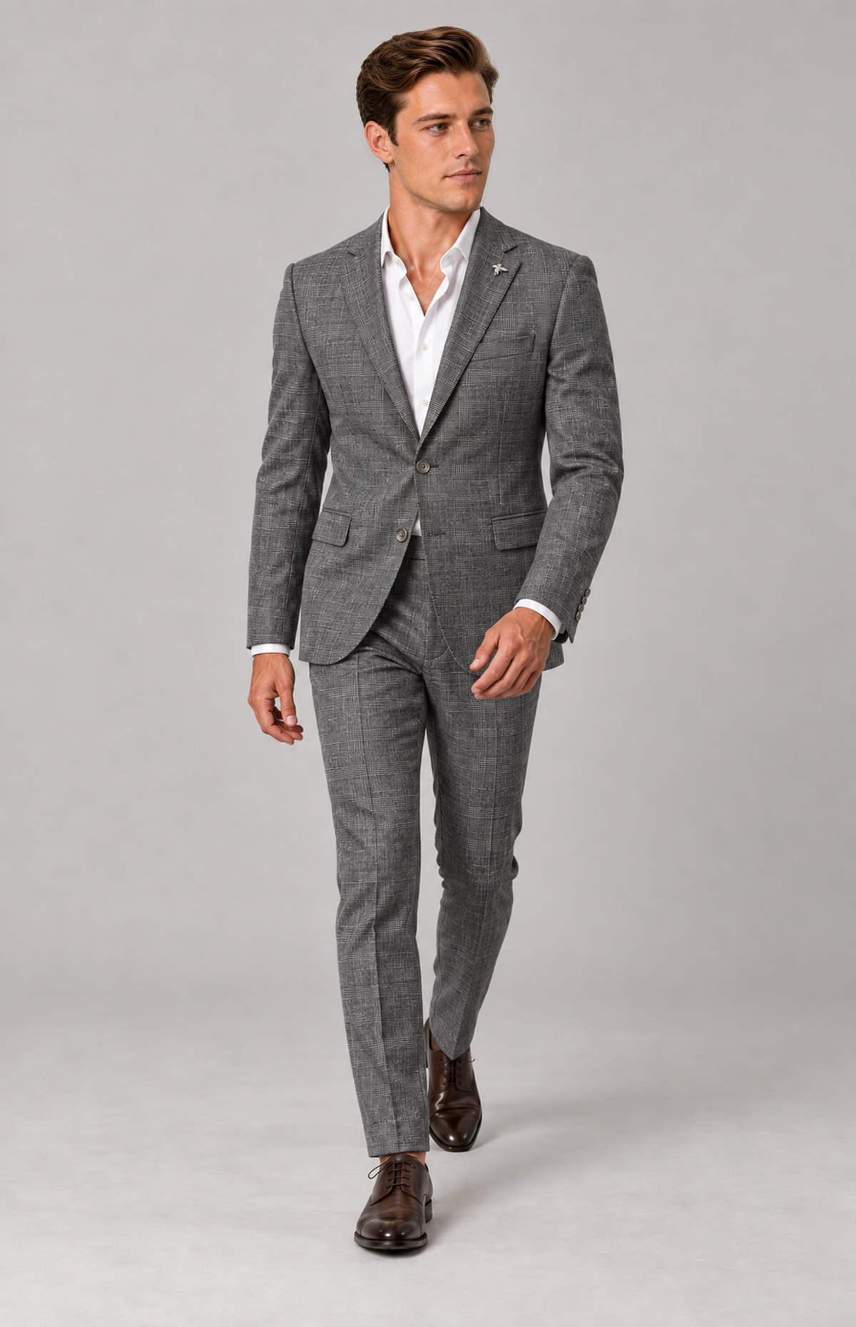 M01 wearing the steel Harper 2138 textured-check suit, full-length walking view. Trousers only; other items are styling.