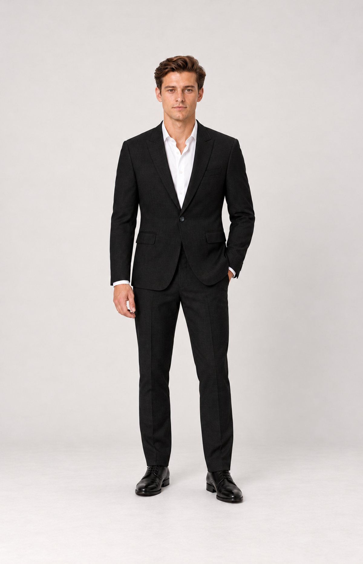 Front full-length styling view of M01 wearing the black 2836 single-button suit jacket with a white shirt and black trousers.