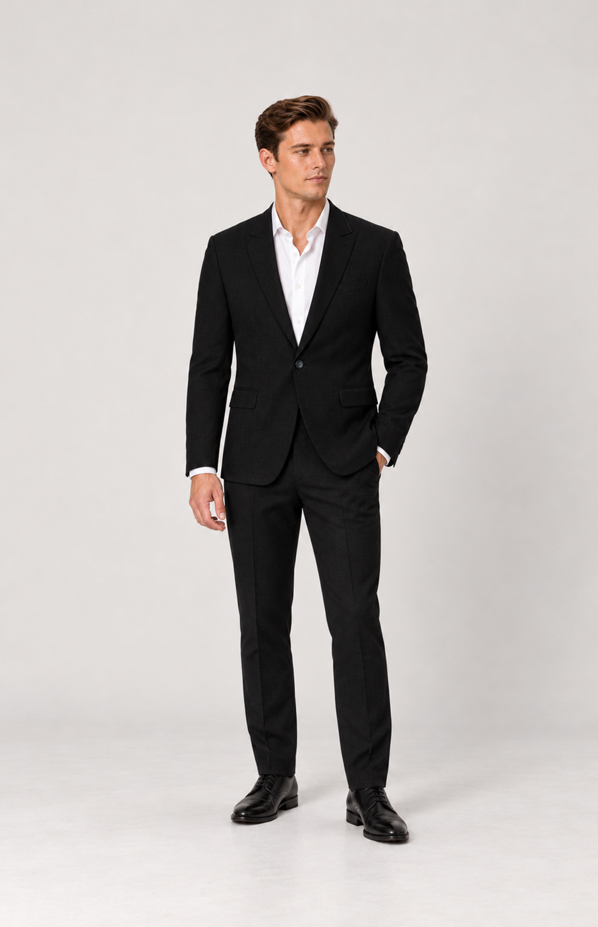 Relaxed full-length styling view of the black 2836 single-button suit jacket on M01.