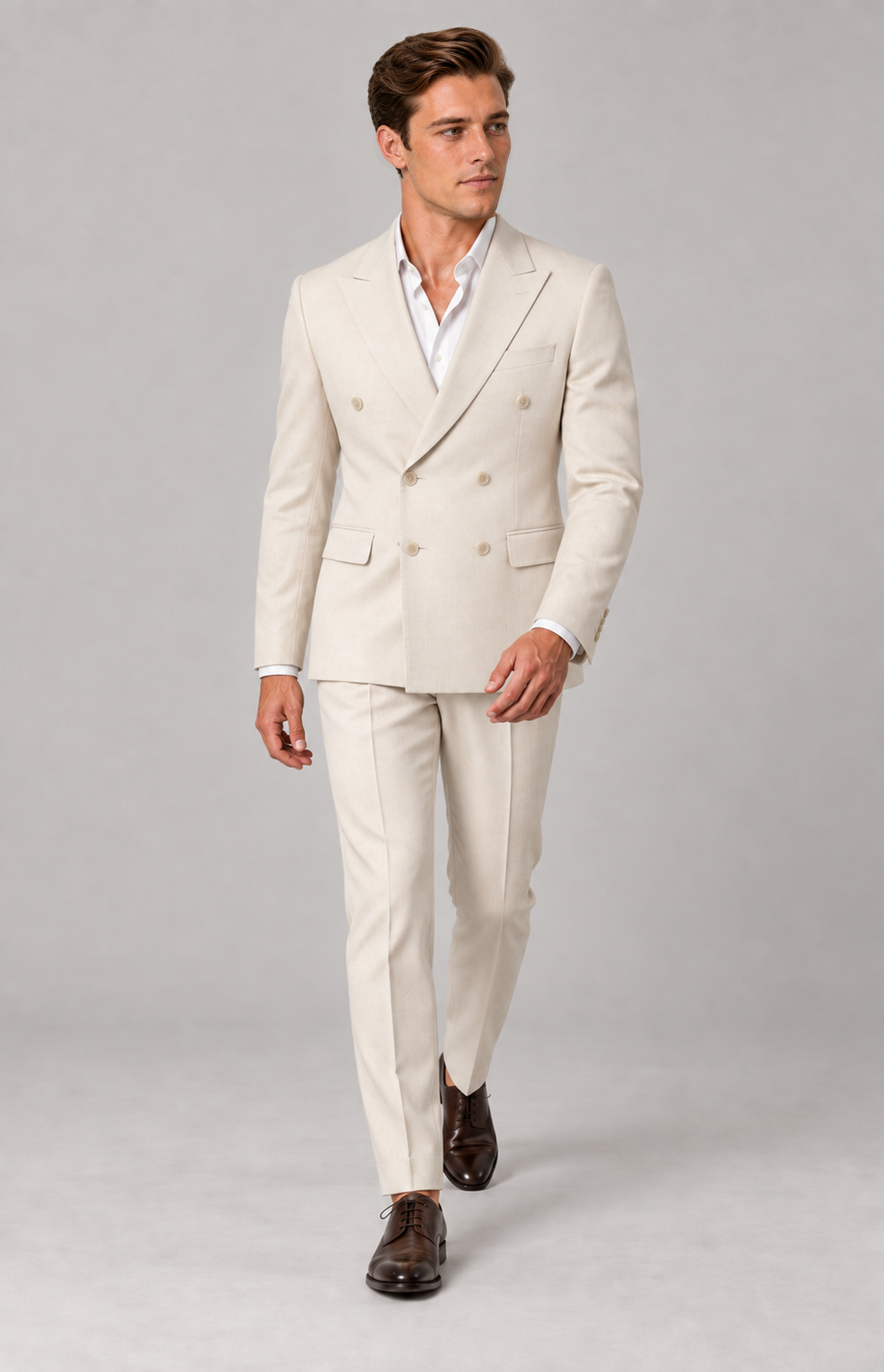 M01 wearing the oatmeal double-breasted 8026DB suit jacket with coordinating trousers, full-length walking view. jacket only; other items are styling.