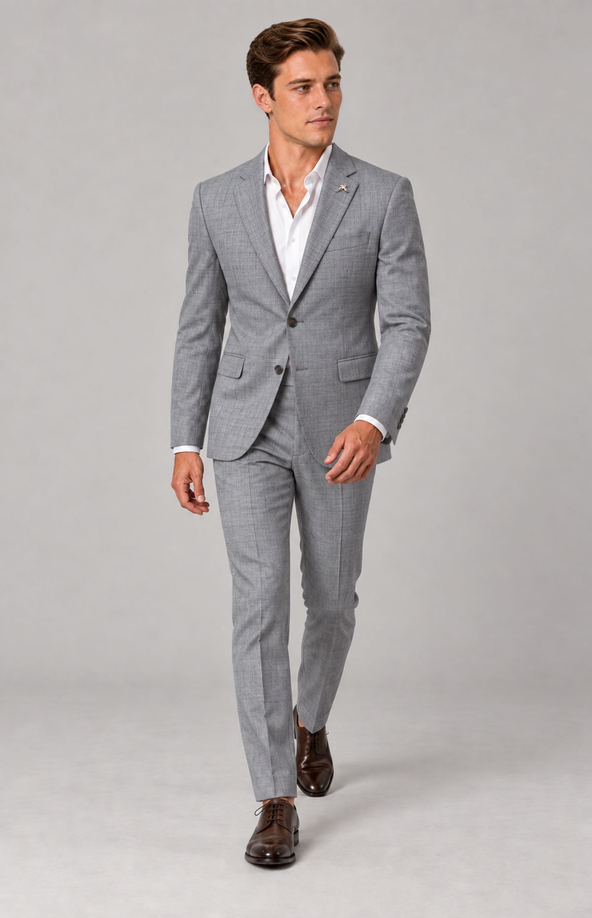 M01 wearing the silver 3368 checked suit, full-length walking view. Trousers only; other items are styling.