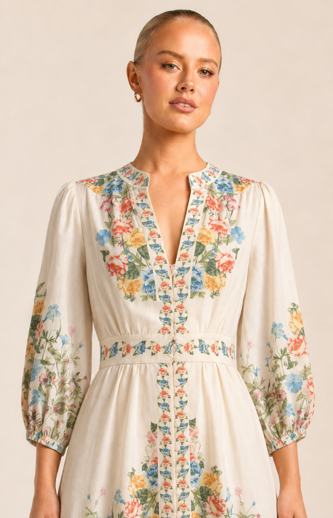 Close view of the floral V-neck trim and covered buttons on dress 46250998-1