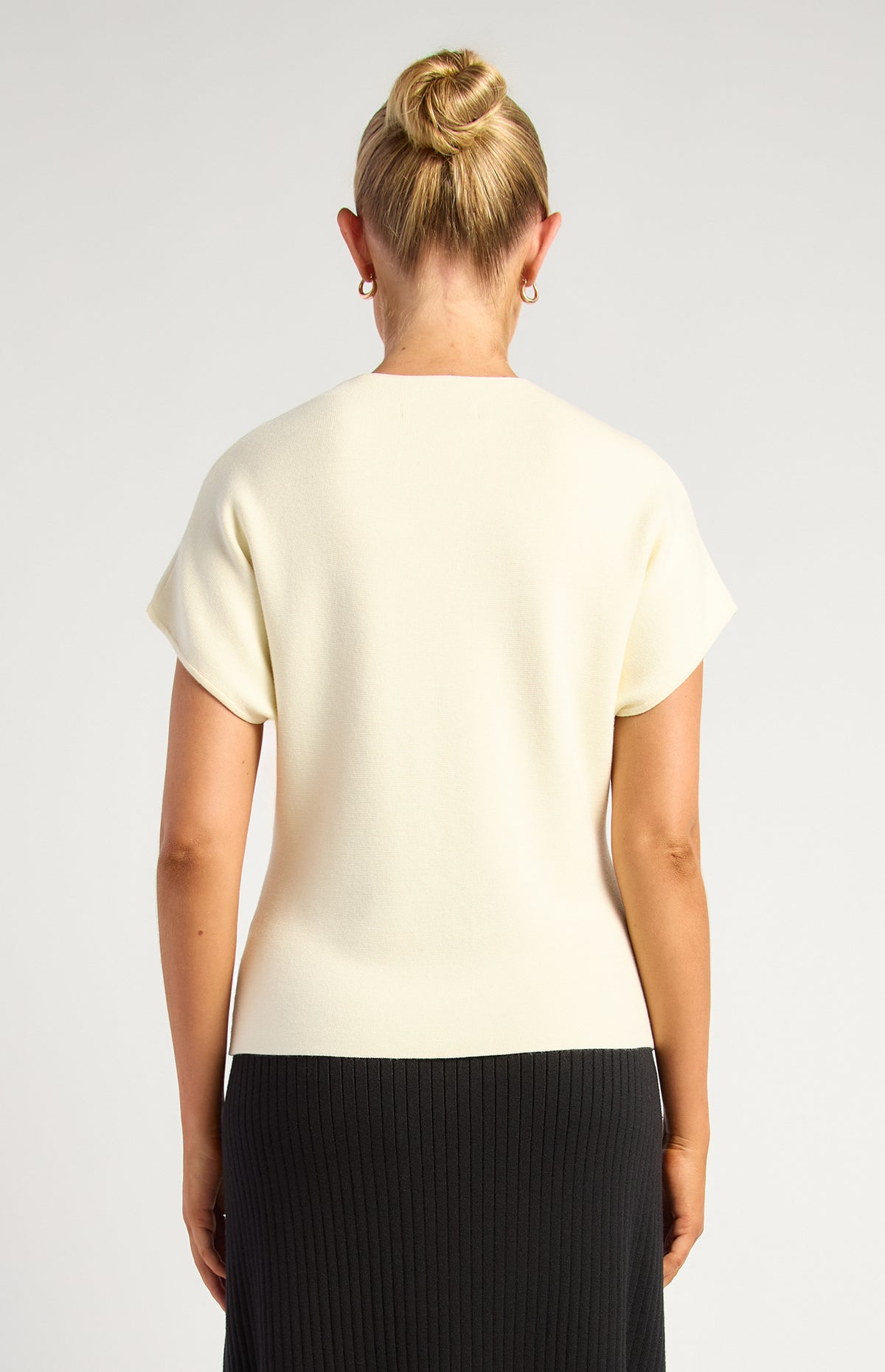 SKN967 white centre-seam knit top, back view
