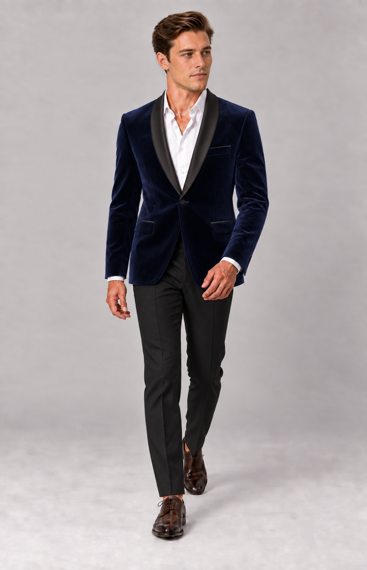 M01 wearing the navy 1281W2 velvet dinner jacket with black satin shawl lapels, full-length walking view. Jacket only; other items are styling.