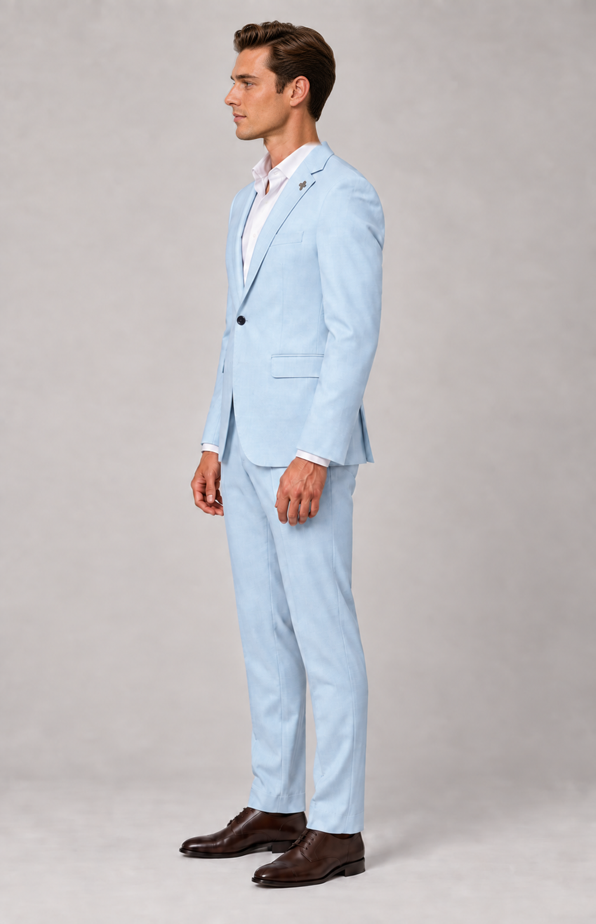 Side view of the ice Quinn 1907 suit trousers, styled with a matching jacket