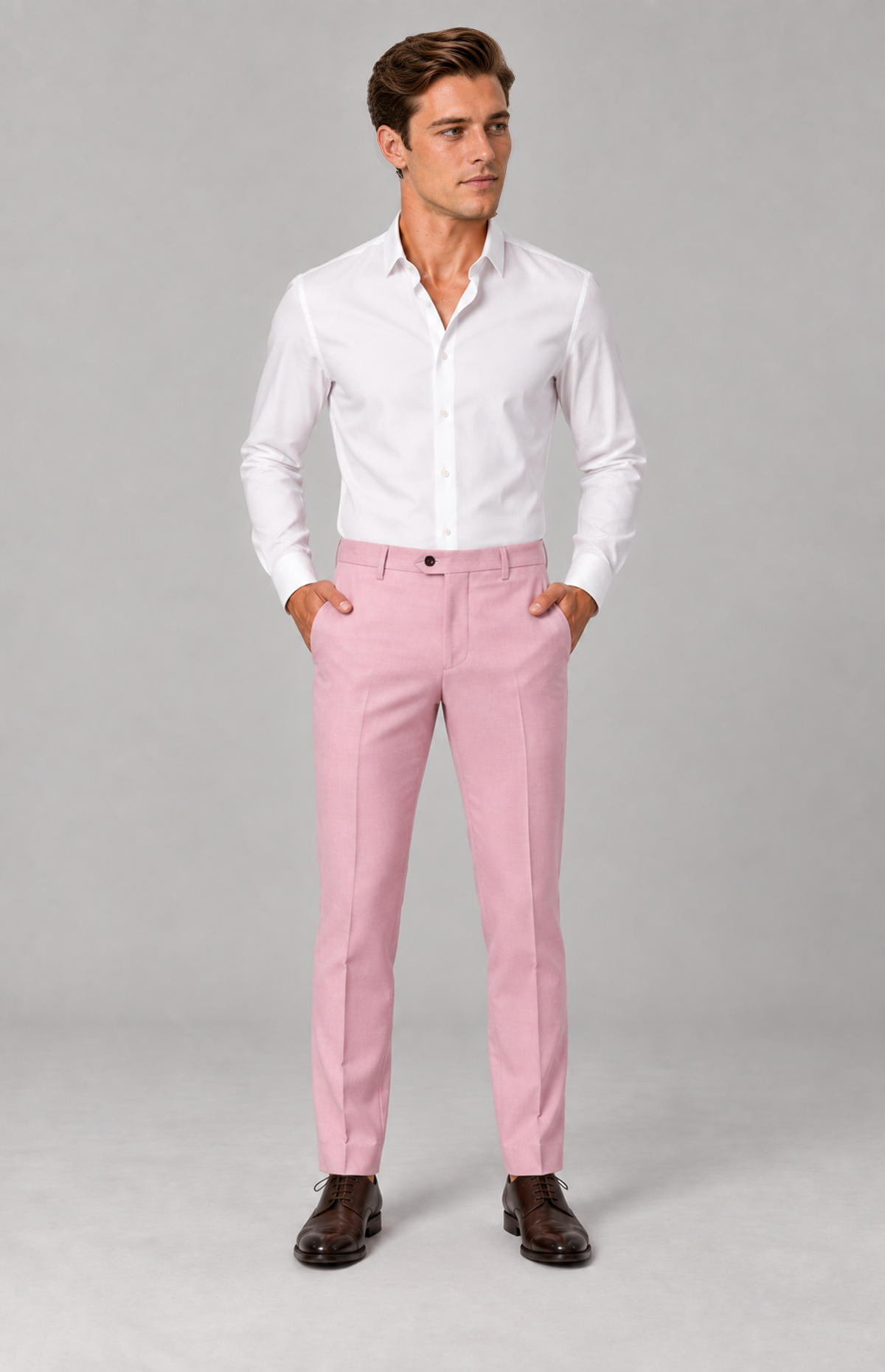 SOGNA Quinn 1907 Pink tailored trousers on M01, front standing view with hands at pockets. Trousers only.