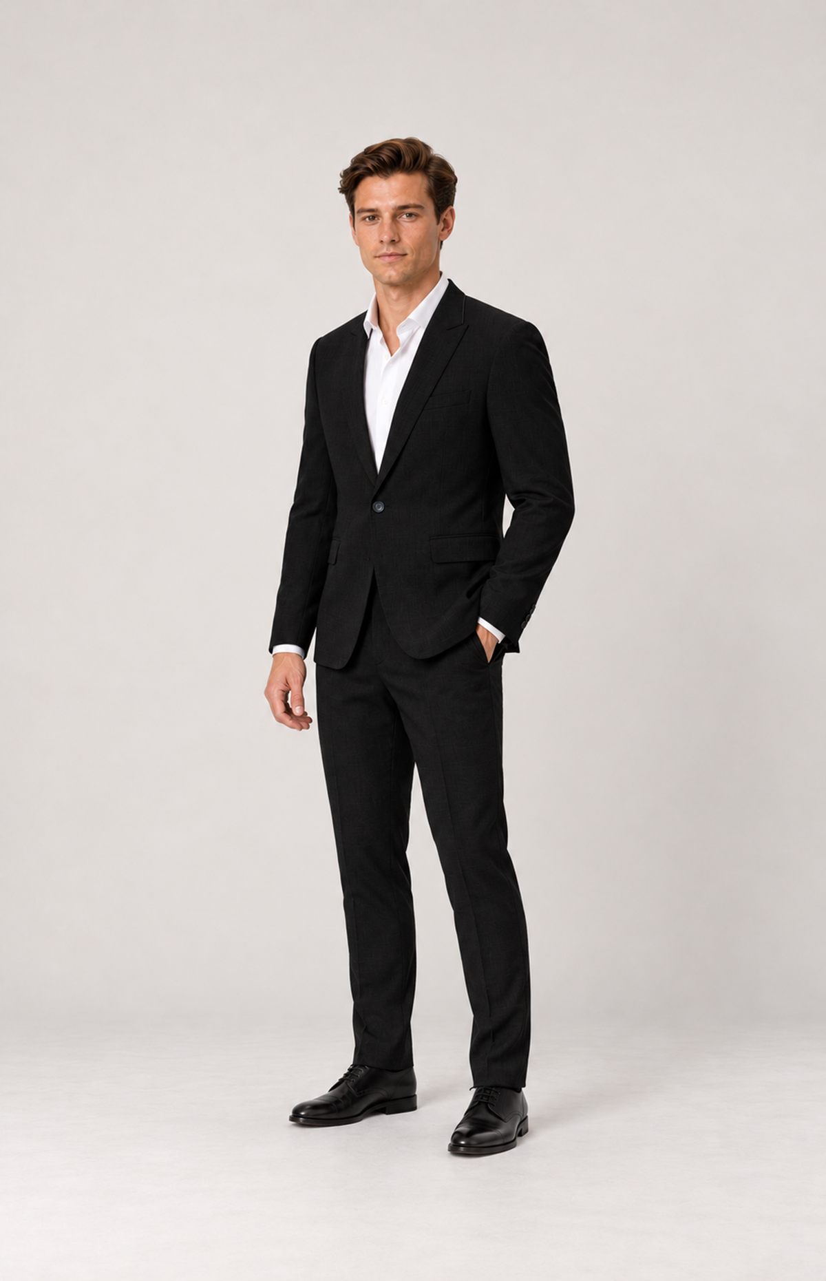 Three-quarter full-length styling view of the black 2836 notch-lapel suit jacket on M01.